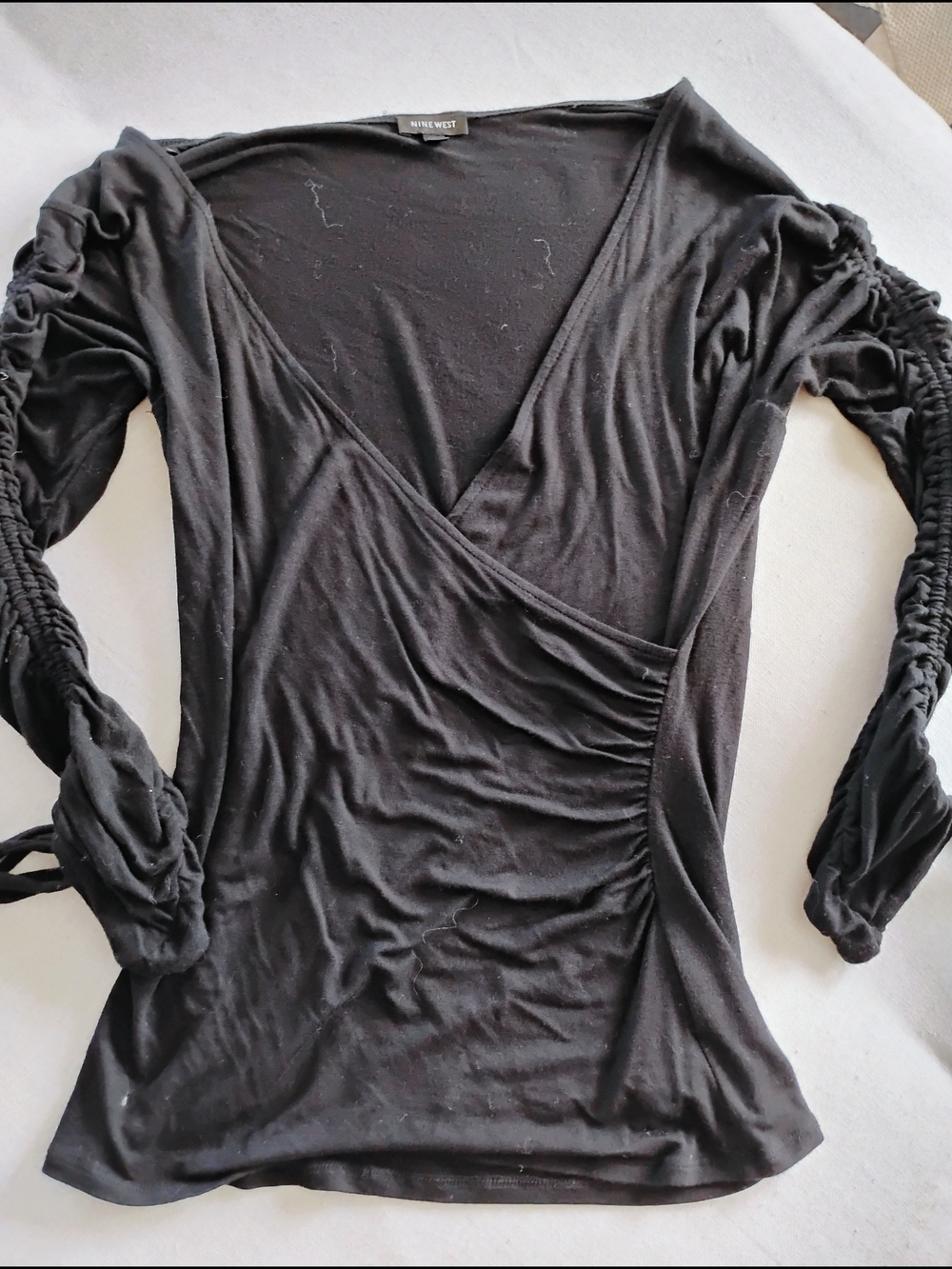 NEW... Without Tags..Nine West Black Ruched Wrap-Style Long Sleeve Top Size S...